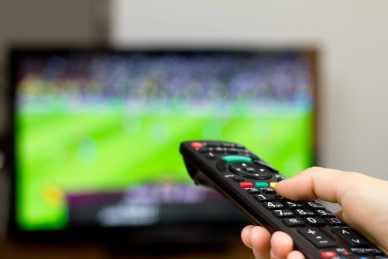 Watching,Soccer,Game,On,Tv