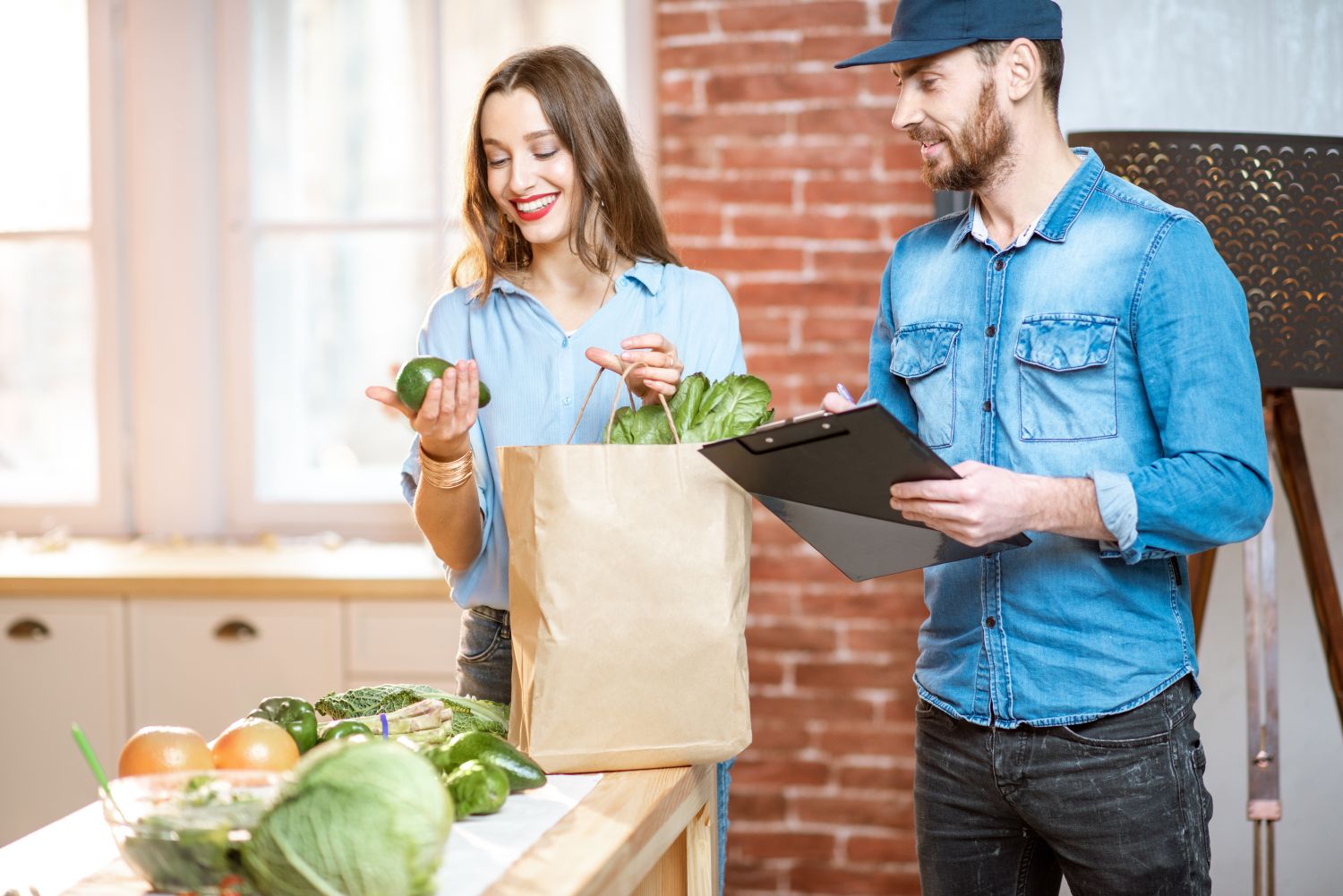 Woman,Client,Cheking,Products,Standing,With,Delivery,Worker,On,The